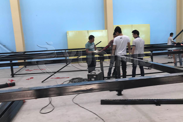 workers who are installing an indoor jump zone